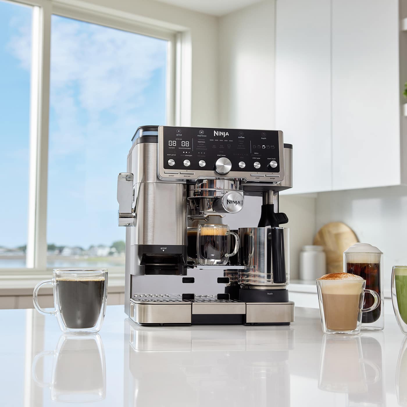 A Ninja Coffee Luxe machine sat on a kitchen worktop