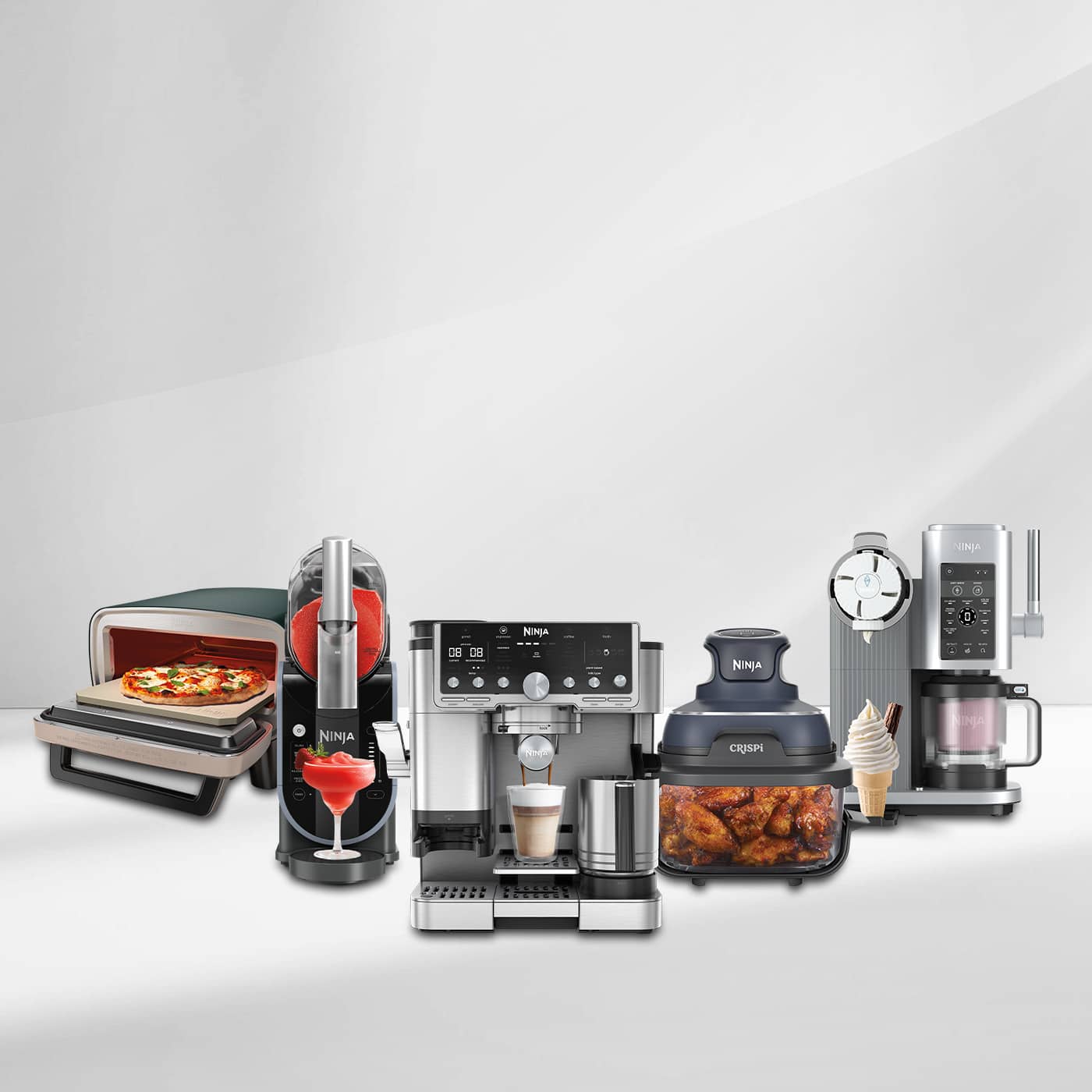 Three Ninja kitchen appliances — including a coffee machine, grill, and oven—displayed on a light grey background.